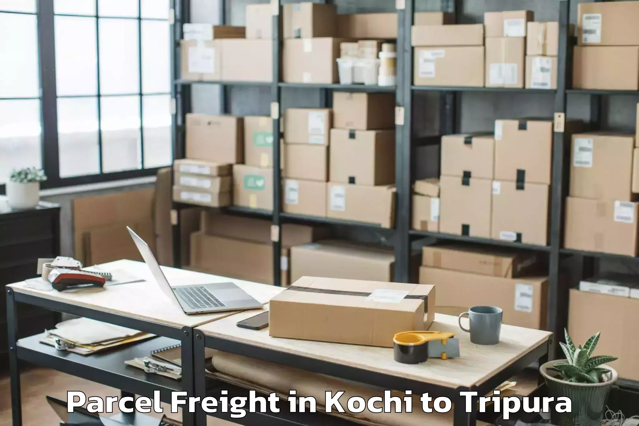 Kochi to Kamalpur Airport Ixq Parcel Freight Booking